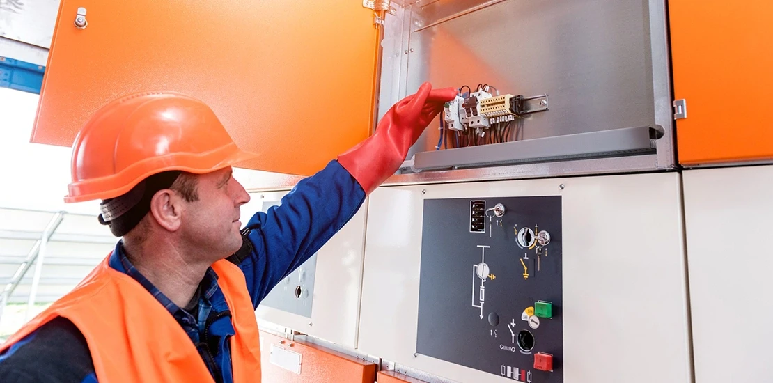 Security consultant reviewing itemized fire alarm system quotes with a facility owner