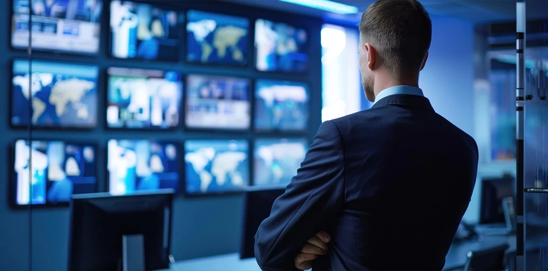 Integrated Security Control Room in a Commercial Facility Integrated security control room showing alarm, CCTV, and access control monitors